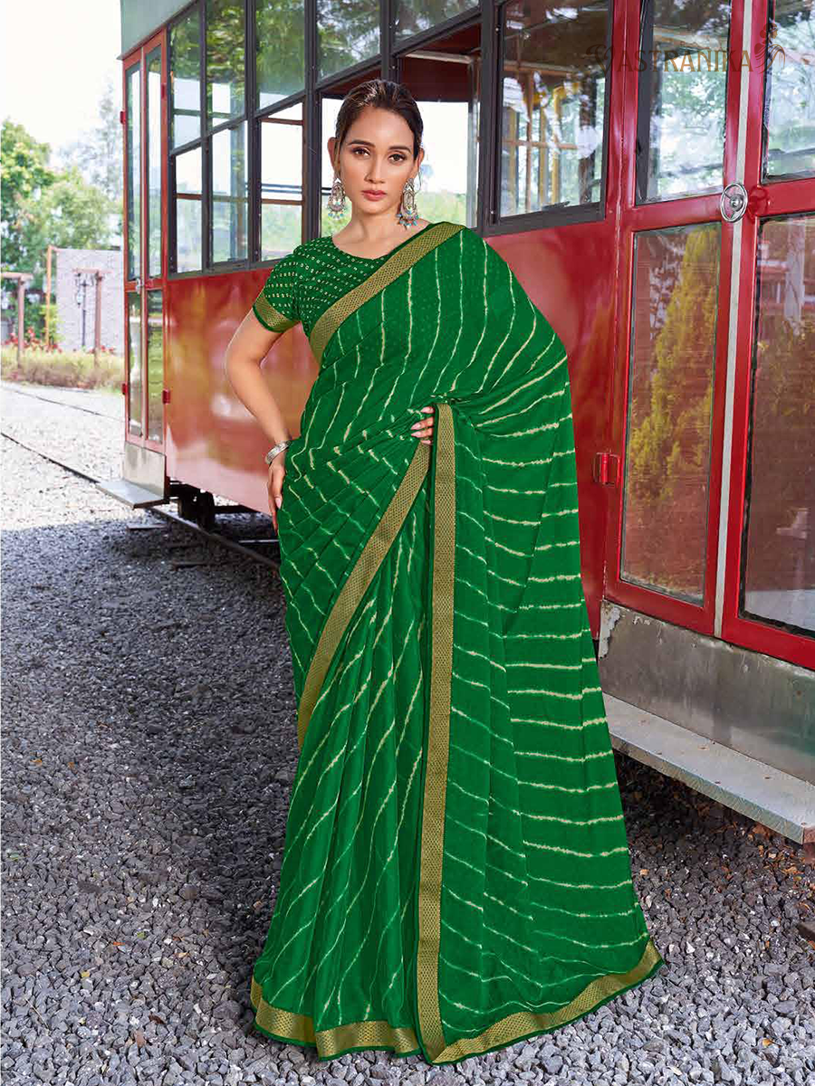 Lush green moss crepe saree with batik and bandhej fusion print, paired with matching printed blouse – Vastranika Sawan collection, Design 45041