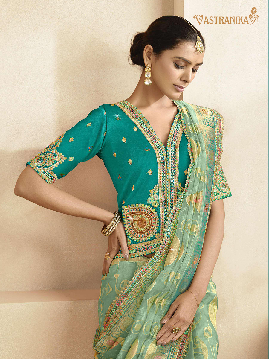 Vastranika Exclusive: Radiant Aqua Green Premium Tissue Silk Saree with Dual Designer Blouses
