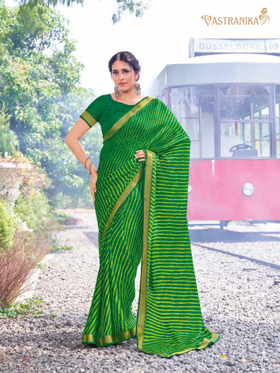 Green moss crepe saree with bold leheriya print, heavy zari border, and printed blouse – Vastranika Sawan festive collection, Design 45040

