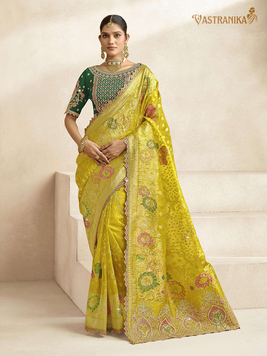 Vastranika Exclusive: Radiant Yellow Premium Tissue Silk Saree with Dual Designer Blouses
