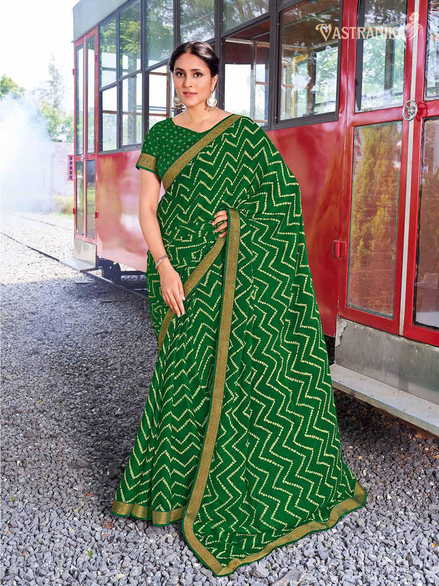 Emerald green moss crepe saree with zig-zag batik leheriya print, zari border, and printed blouse – Vastranika 45032 festive wear

