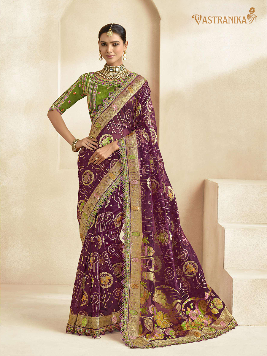 Vastranika Wine Purple Tissue Silk Saree with Green Embroidered Blouse