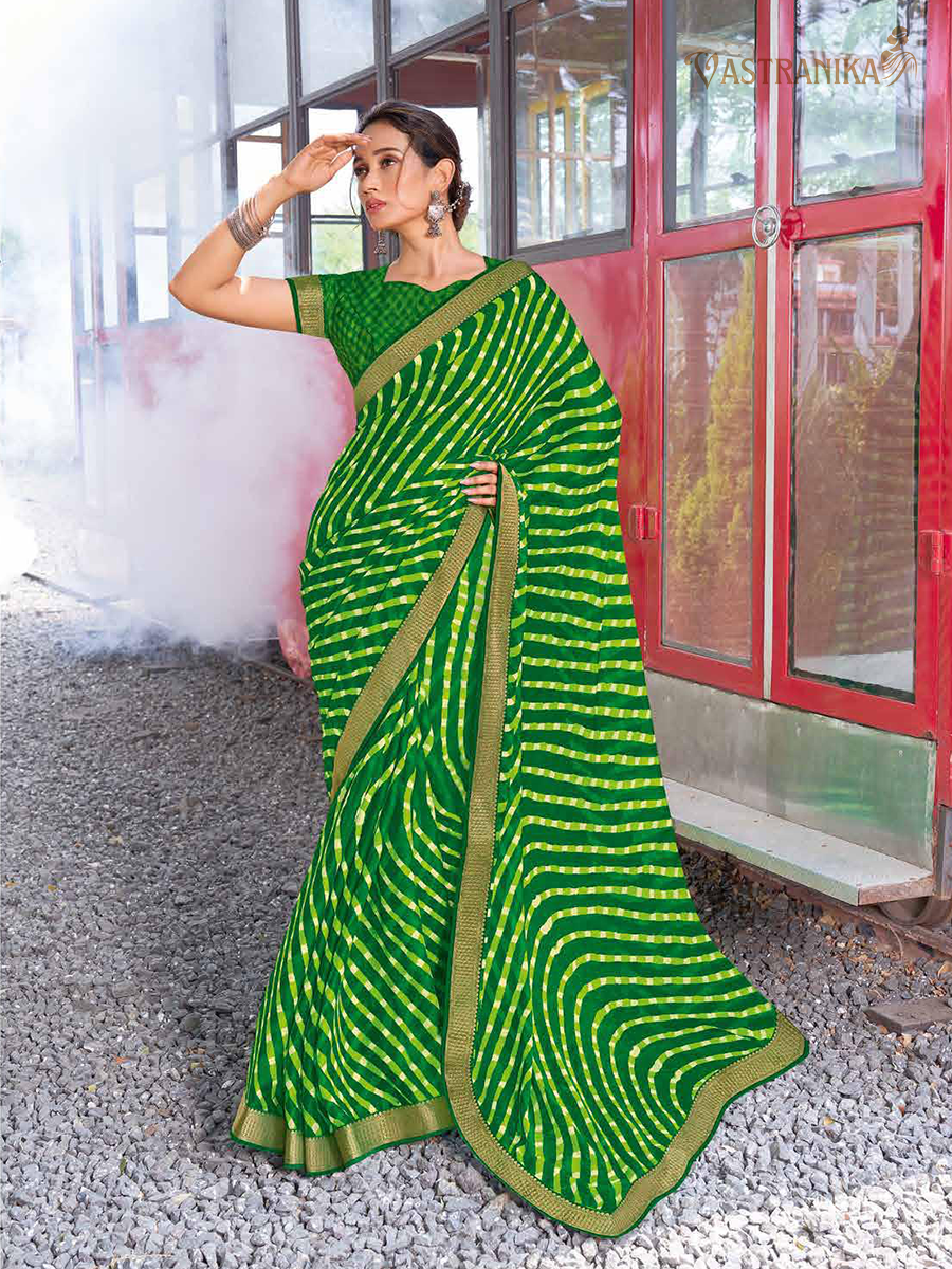 Green moss crepe saree with bold leheriya print, zari border and printed blouse – Vastranika Design 45034 Sawan festive collection