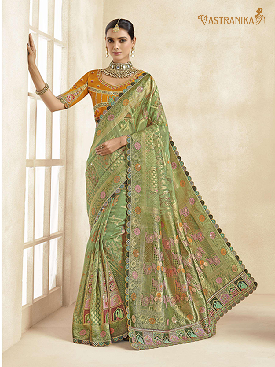 Vastranika Exclusive: Enchanting Green Premium Tissue Silk Saree with Dual Designer Blouses