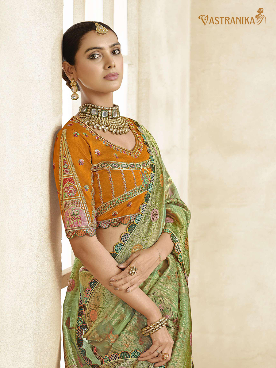 Vastranika Exclusive: Enchanting Green Premium Tissue Silk Saree with Dual Designer Blouses
